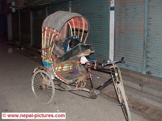 Rikshaw driver sleeping Kathmandu