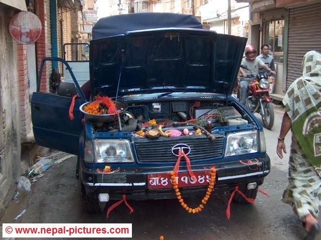 Car being bleshed or worshipped during Dashain festival
