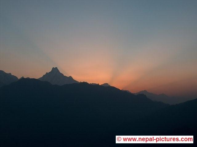 Sunrise behind Machhapuchhre mountain