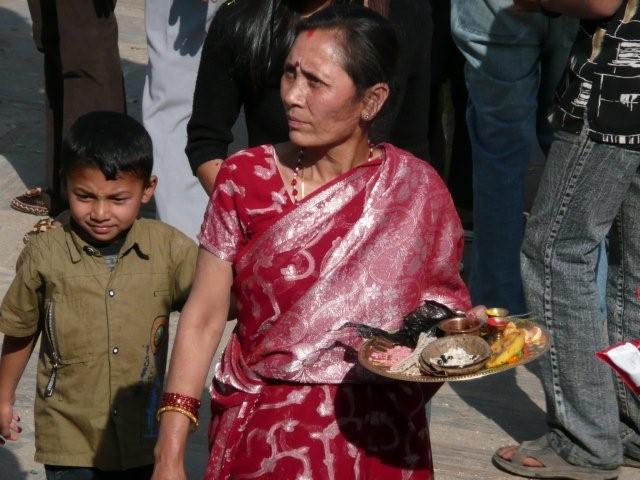 Woman with offerings in Bhaktapur