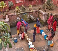 Women waiting at watertap in Patan