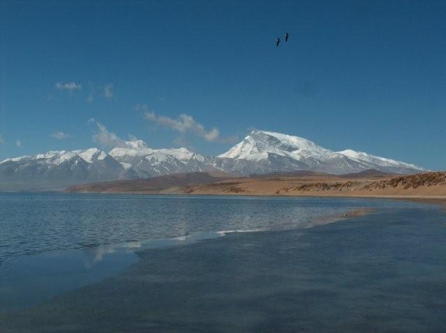 Partly frozen Lake Manasarovar Gurla Mandhata
