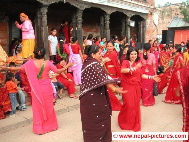 Women dancing during Teej