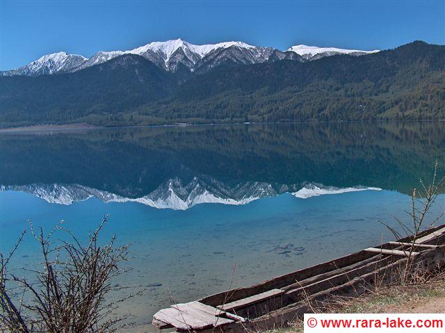 Rara lake with wooden boat